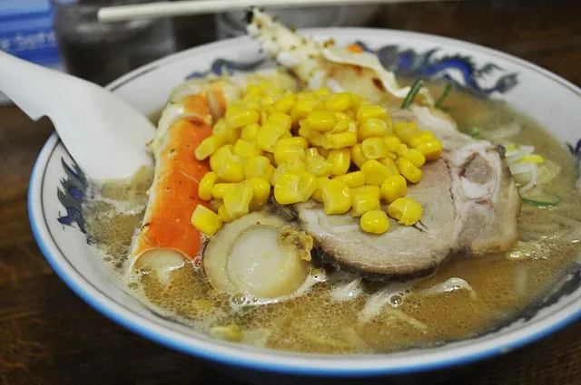 Miso ramen photographed in Sapporo. An actual miso ramen bowl photographed at a ramen shop in Sapporo. This particular serving includes its own selection of toppings.