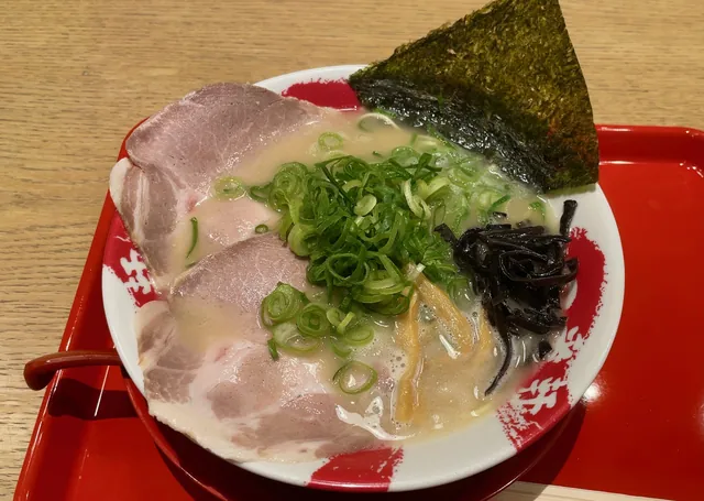 White tonkotsu ramen at Ichibanken. An actual white tonkotsu ramen bowl photographed at Ichibanken in iias Kasugai, Aichi.