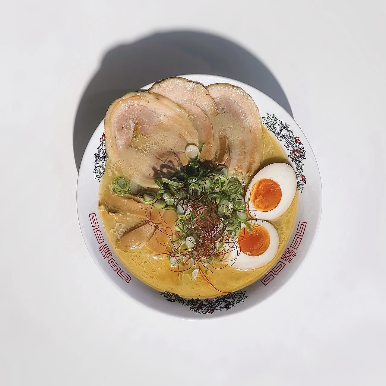 Tori paitan ramen. An actual ramen bowl identified by its photographer as tori paitan, with a cloudy chicken-bone broth. This is chicken paitan, not a tonkotsu substitute.