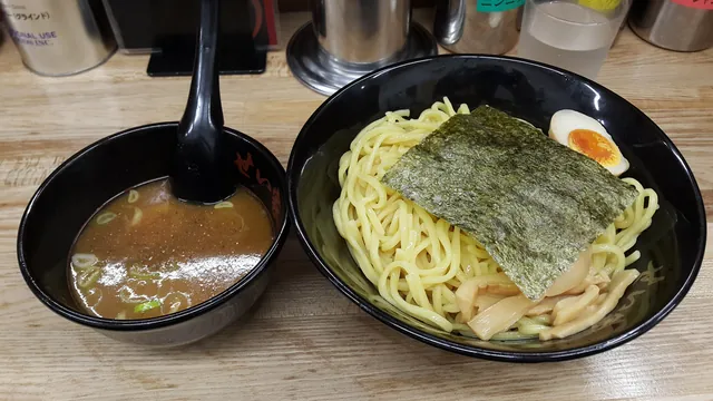 Tsukemen: separate noodles and dipping soup. Actual tsukemen with noodles and dipping soup served in separate bowls. The source does not establish a currently recommended shop.