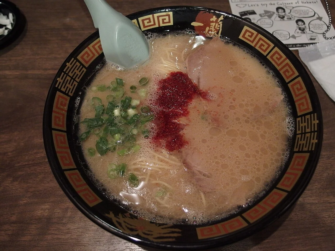 Milky tonkotsu broth with sliced pork, scallions and red seasoning at Ichiran Shinjuku.